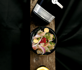Sea-beam ceviche with champagne blanc de blanc from Julien Chopin